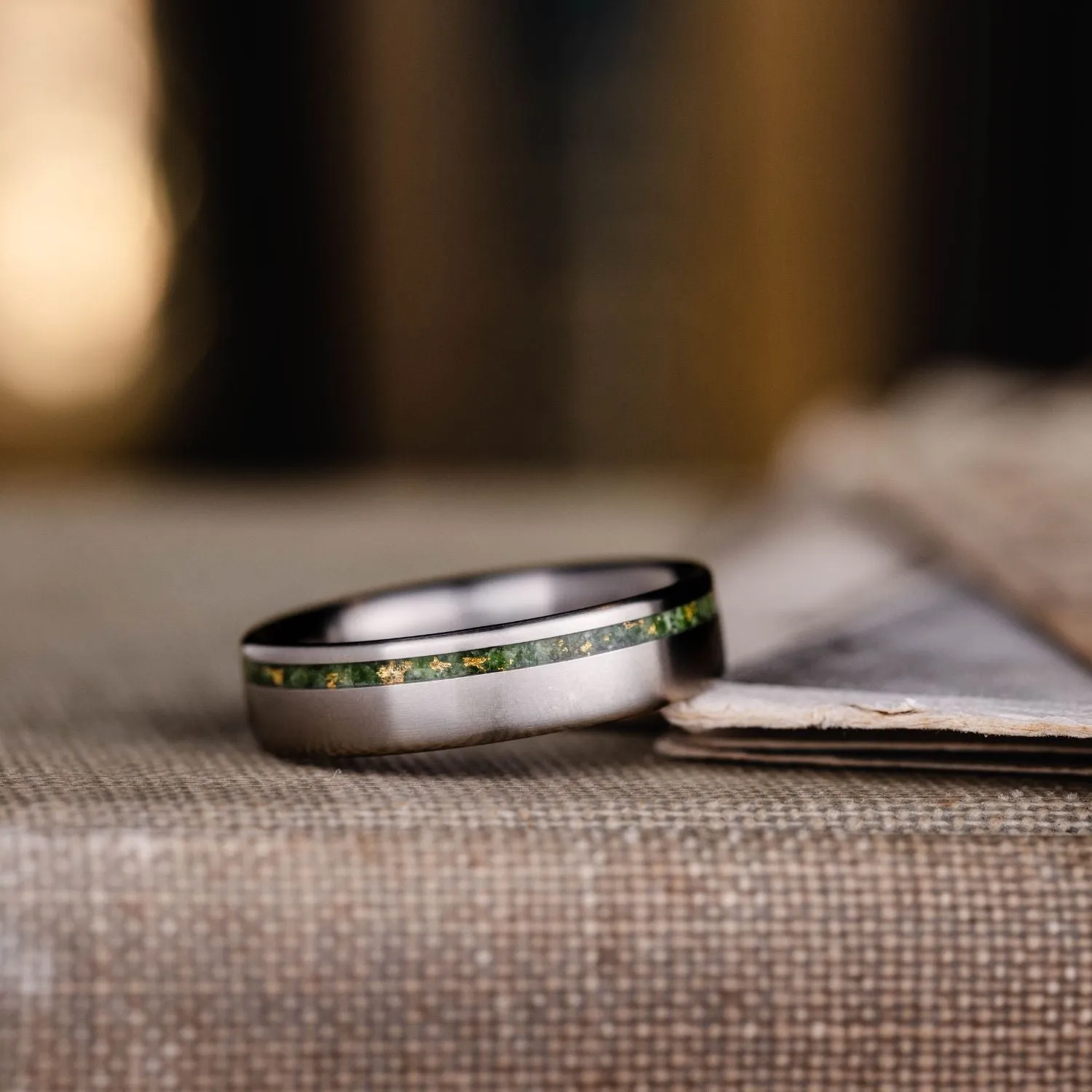 The Fairbanks | Men's High Polish Titanium Wedding Band with Green Imperial Diopside & Gold Flakes Offset Inlay