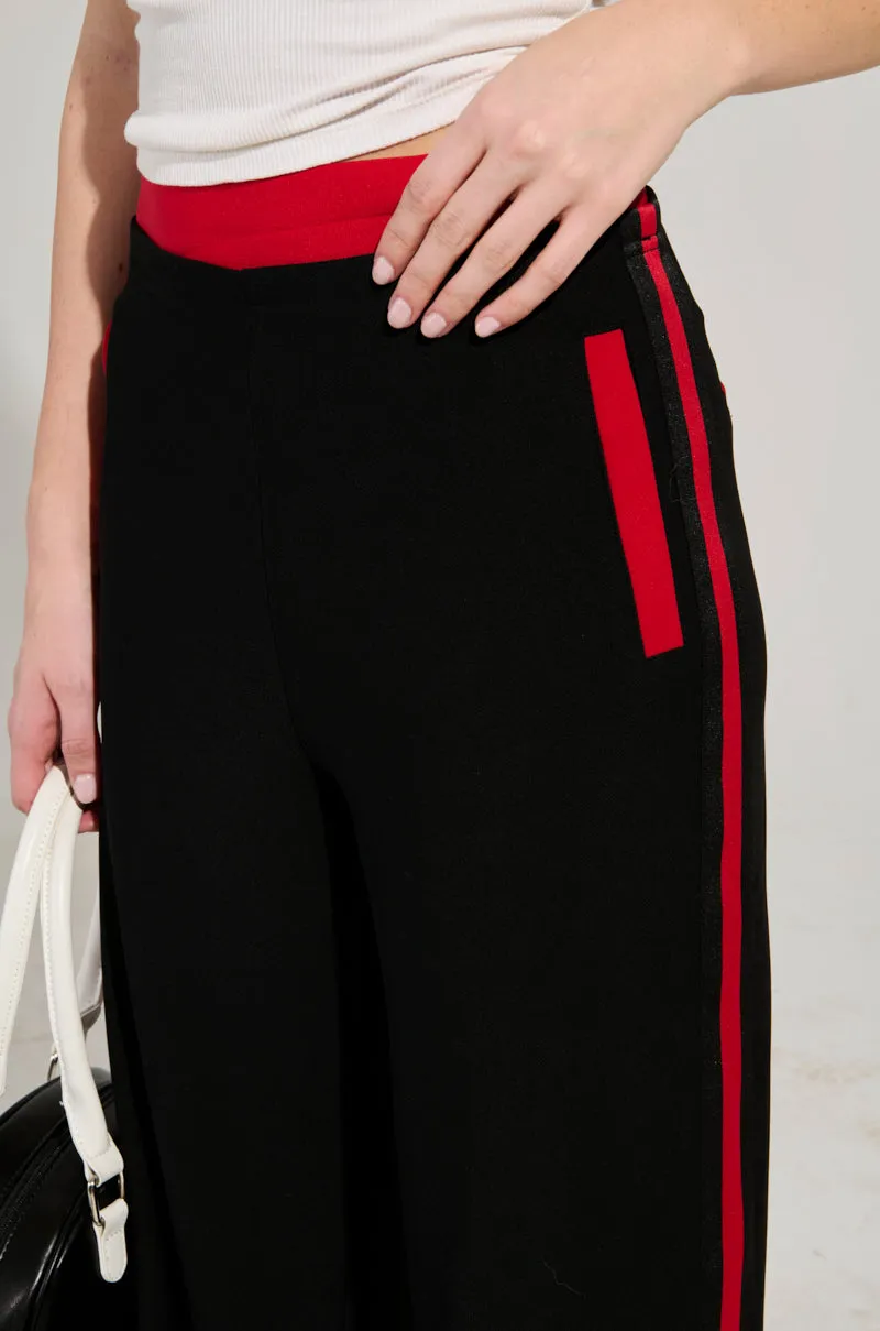 VARSITY LEAGUE STRIPED WOVEN ELASTIC TROUSER IN BLACK RED